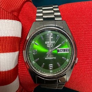 Seiko silver and green automatic watch